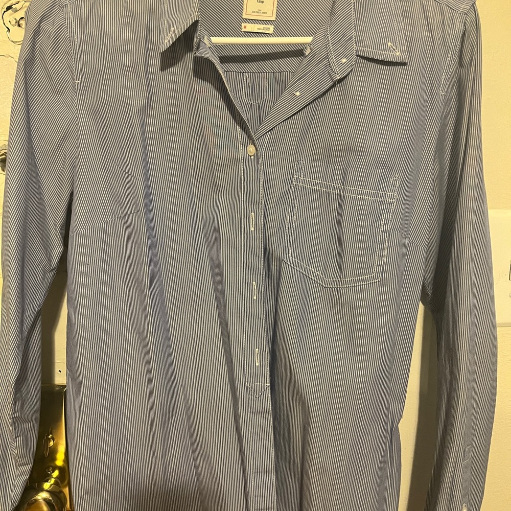 button down shirt with small pinstripes in white.